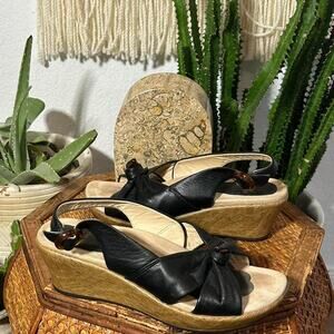 Dansko Black and Tan Wedge Sandals